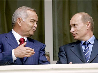 Владимир Путин и Ислам Каримов на встрече в Сочи, май 2006, фото AFP