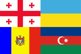 Флаги государств-членов ГУАМ (по часовой стрелке): Грузия, Украина, Азербайджан, Молдавия