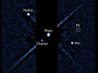    .     P4.  NASA, ESA, and M. Showalter (SETI institute)