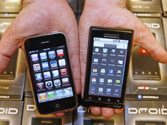 Apple iPhone  Motorola.  ©AFP